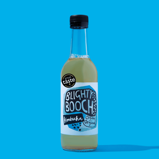 Bottle of Blighty Booch Organic Original Kombucha on a Blue background